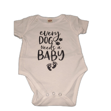 Load image into Gallery viewer, Every Dog Needs a Baby” Romper 0-3 months
