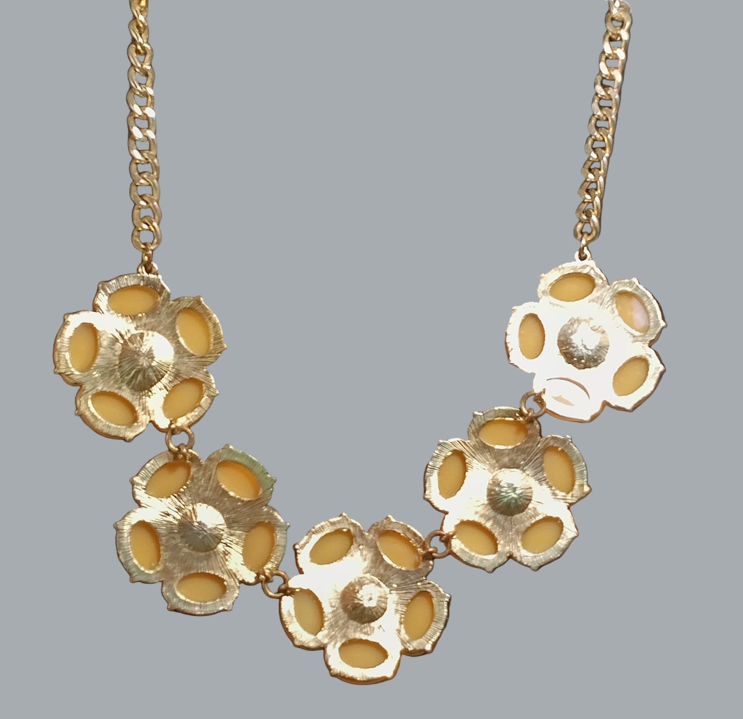 Natasha Gold Floral Rhinestone Statement Necklace.”