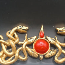 Load image into Gallery viewer, Gold Serpent Medusa Style Headband with Red Gem Center – 10” Mythic Display

