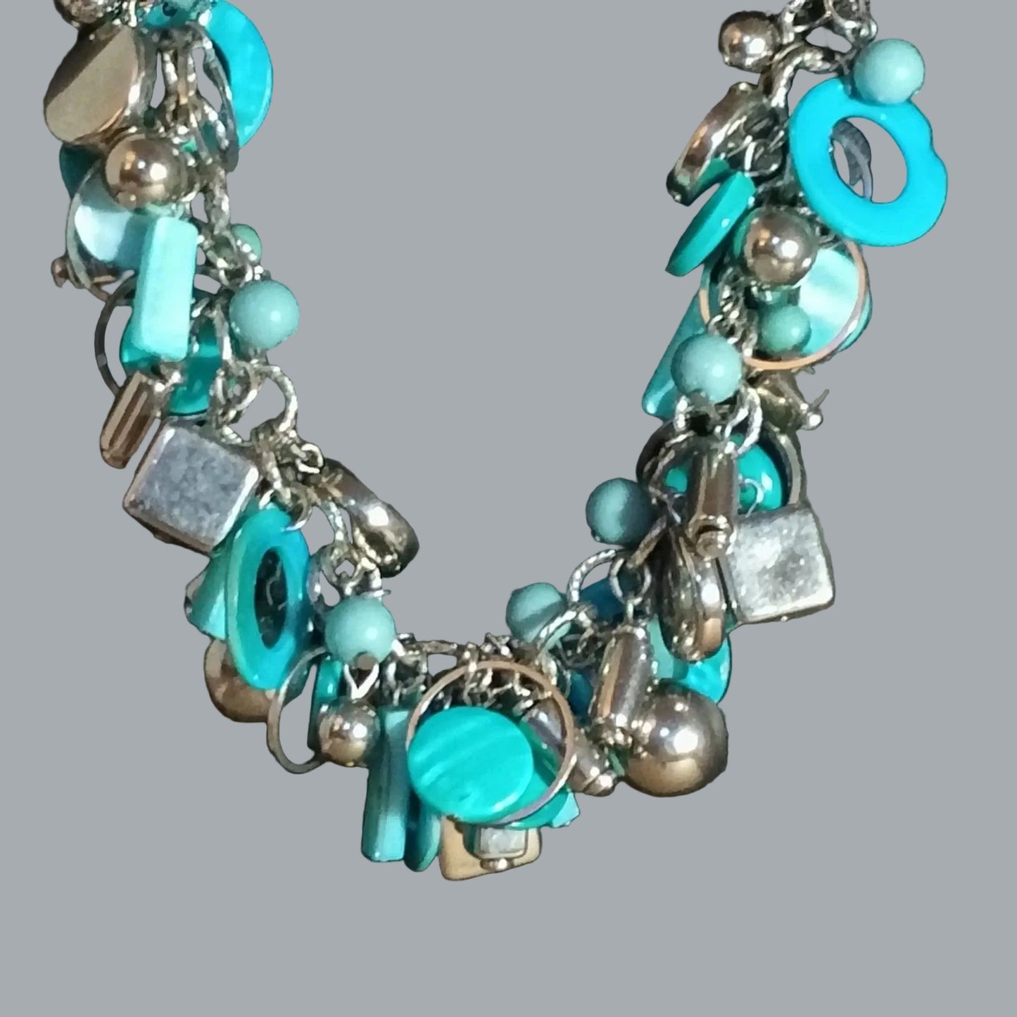 Vintage 1960s Mod Turquoise/teal beads Charm Cluster Necklace Silvertone Chain
