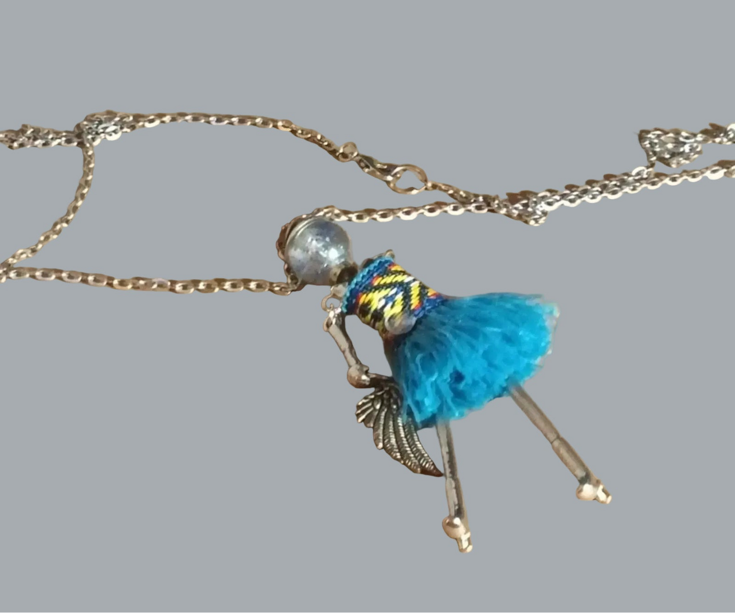 Boho Doll Pendant Necklace 28" Silvertone Chain Turquoise Fringe 4.5"