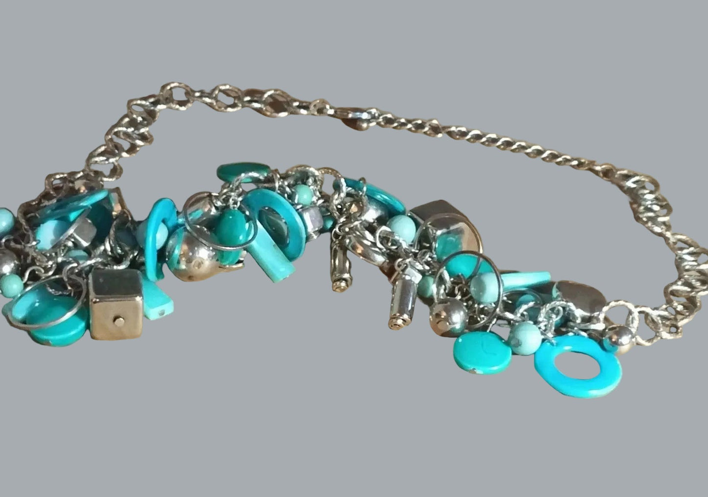 Vintage 1960s Mod Turquoise/teal beads Charm Cluster Necklace Silvertone Chain